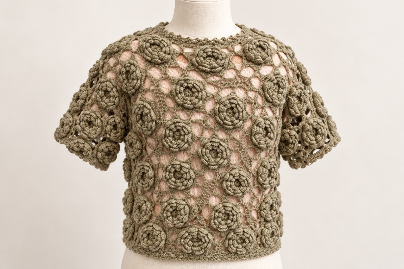 Dimensional rose crochet garment