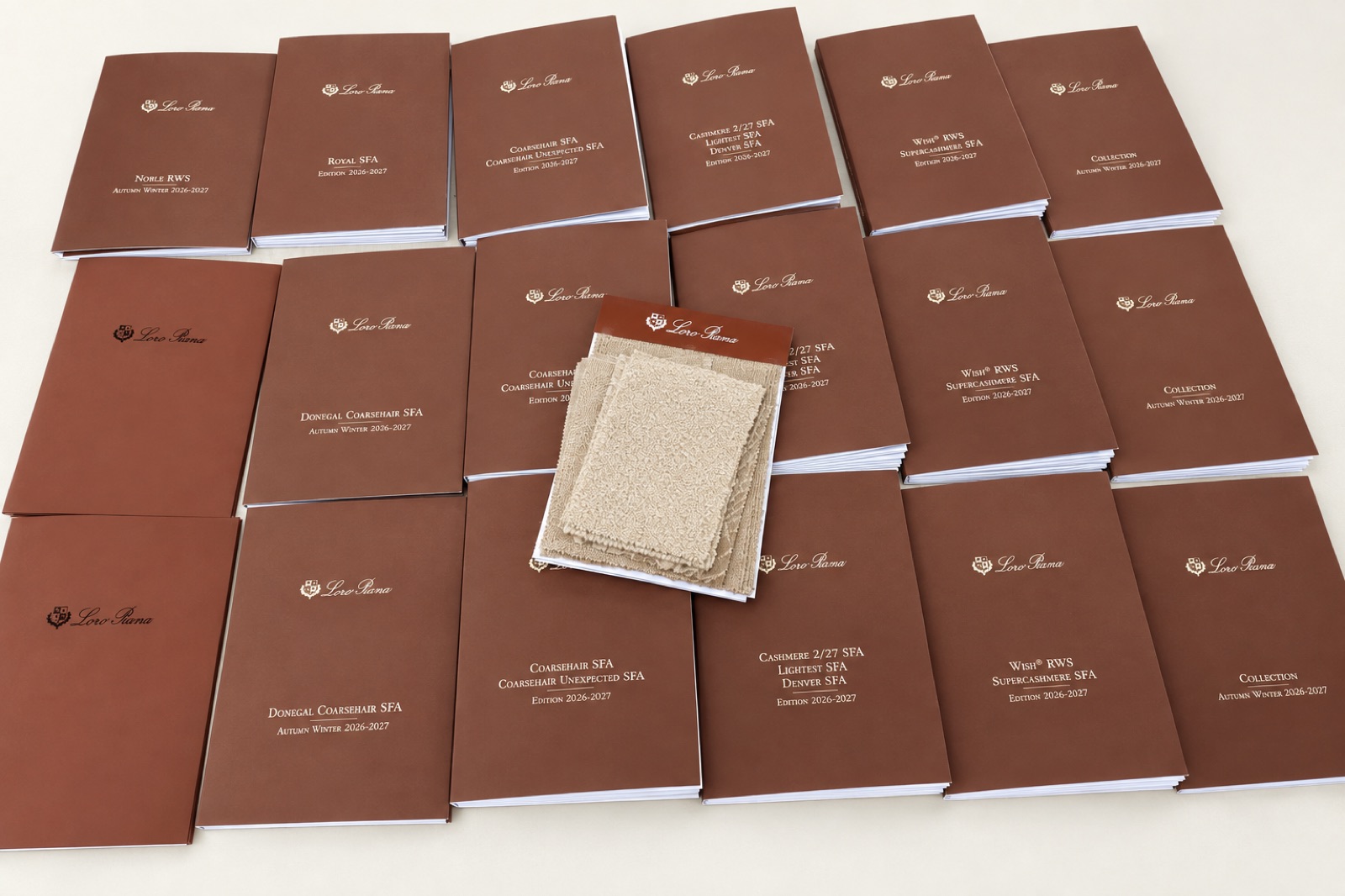 Loro Piana yarn colour-card books and knit swatches